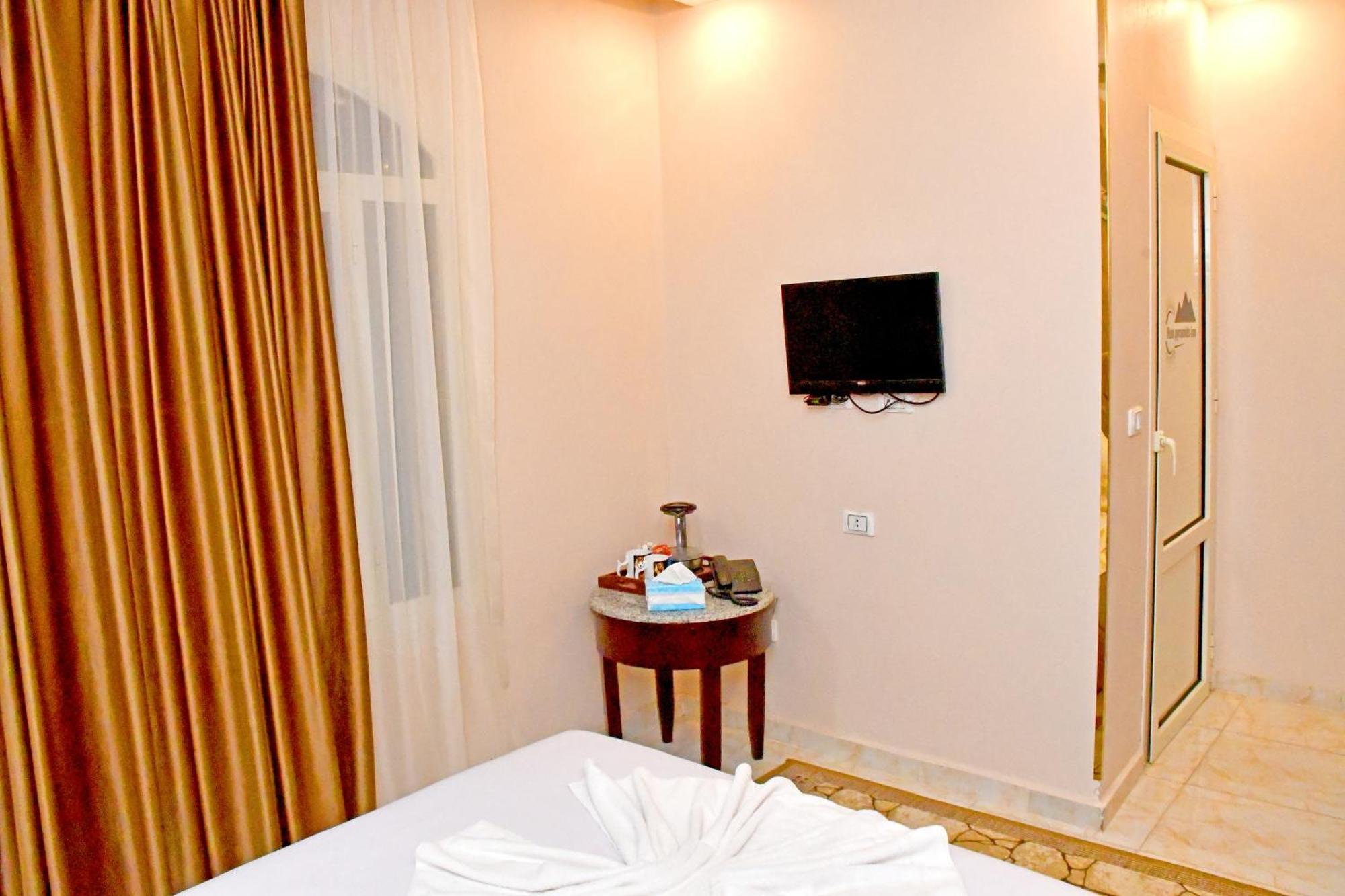 Nun Pyramids Inn Kafret el-Gabal Habitación foto